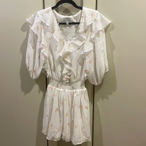 SABOSKIRT White dress/bright red flowers. Fits XS-M. It’s a little too long!